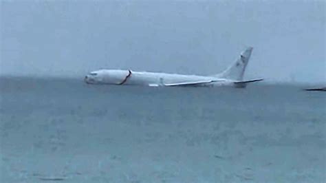 Navy Plane Overshoots Runway In Hawaiis Kaneohe Bay Lands In Water