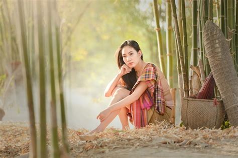 premium photo thai woman in traditional costume asian beautiful woman wearing traditional thai