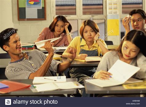 High School Students Bored In A Classroom Stock Photo