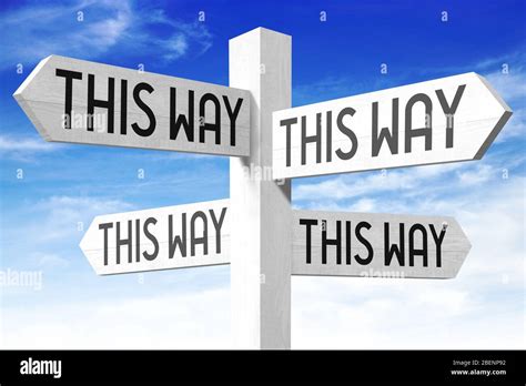 This Way Wooden Signpost Stock Photo Alamy