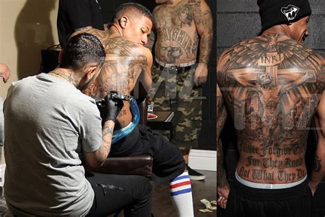 Check spelling or type a new query. Nick Cannon Has New Huge Back Tattoo