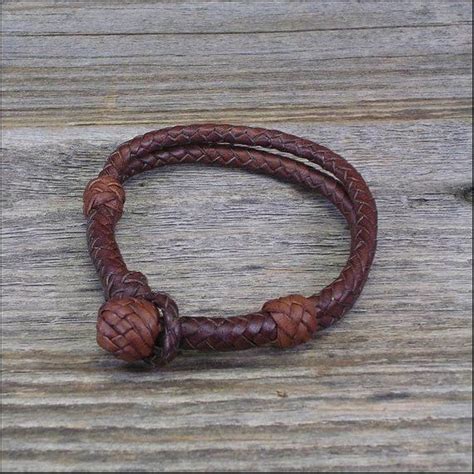 Bracelet braid with your hands. 12 Strand Braided Leather Bracelet | Braided leather bracelet, Leather bracelet, Braided leather