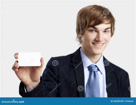 Businessman Holding A Business Card Stock Image Image Of Handsome