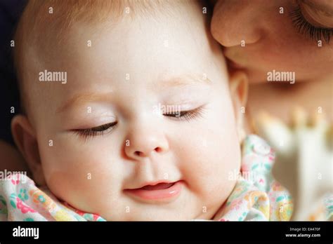 Mom And Baby Faces Stock Photo Alamy