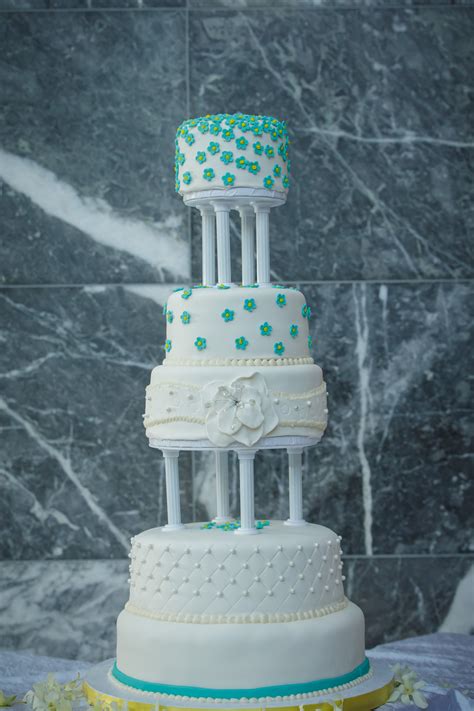 Turquoise And White Tiered Wedding Cake