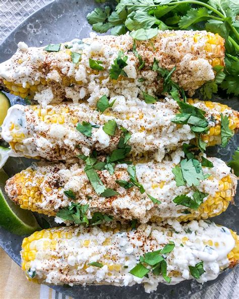 Roasted tender and topped with cotija cheese, cilantro, chili powder, and lime juice, this take on mexican street corn is sure to be a hit as a side dish peel down husks and rub each ear of corn with 1 tablespoon butter. VEGAN MEXICAN STREET CORN | Vegan Elotes | Recipe | Edgy veg, Vegan mexican, Mexican street corn