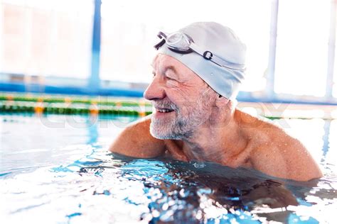 Senior Man In An Indoor Swimming Pool Stock Image Colourbox