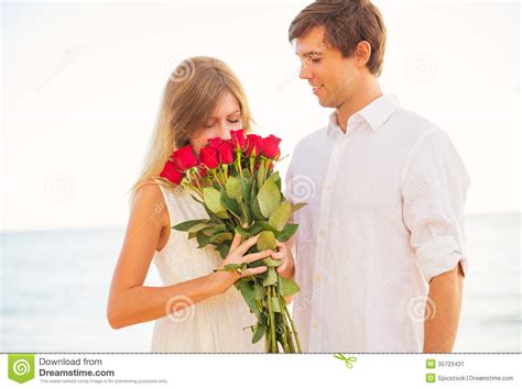 Romantic Young Couple In Love Man Giving Beautiful Young