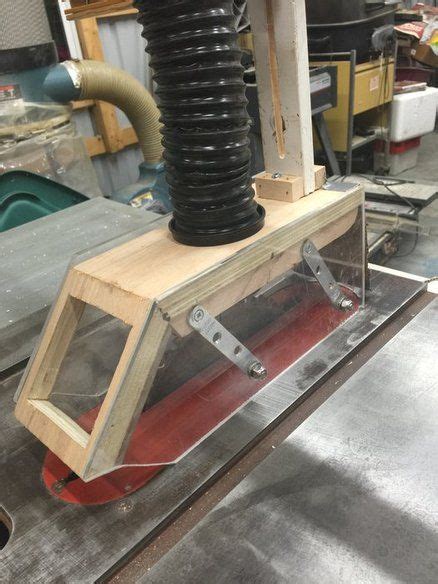 The table saw blade operates at a tremendous speed of more than a hundred miles per hour. Table Saw Fence-Arm Dust Collection/Blade Guard | Woodworking storage, Woodworking projects that ...