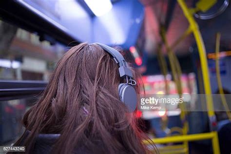 Woman Bus Headphones Photos And Premium High Res Pictures Getty Images