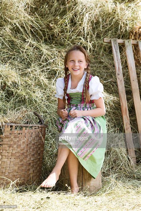 Germany Bavaria Girl In Traditional Dirndl Photo Getty Images