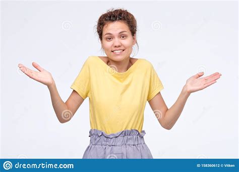 Shrugging Ethnic Woman In Doubt Doing Shrug Showing Open Palms Stock Photo Image Of Facial