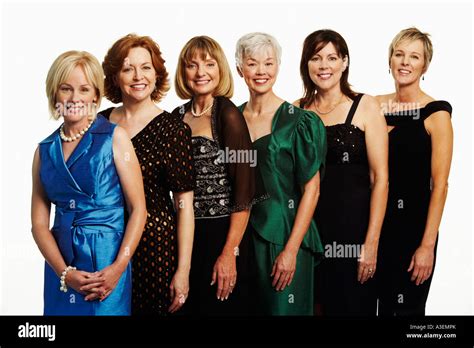 Portrait Of A Group Of Mature Women Standing Together And Smiling Stock