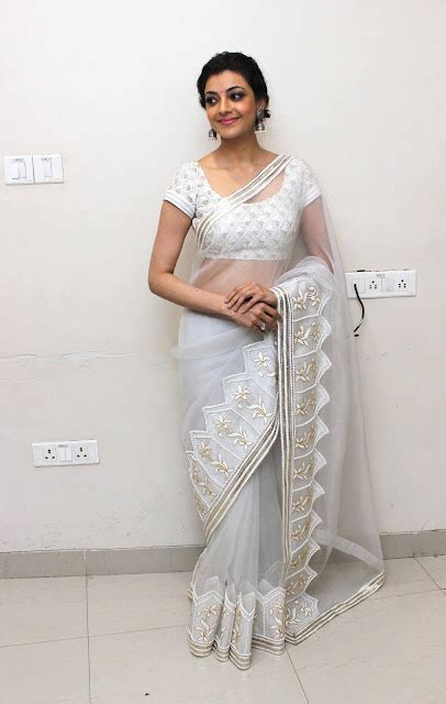 Kajal Aggarwal Sizzles In A White Transparent Tisha Saree And Blouse