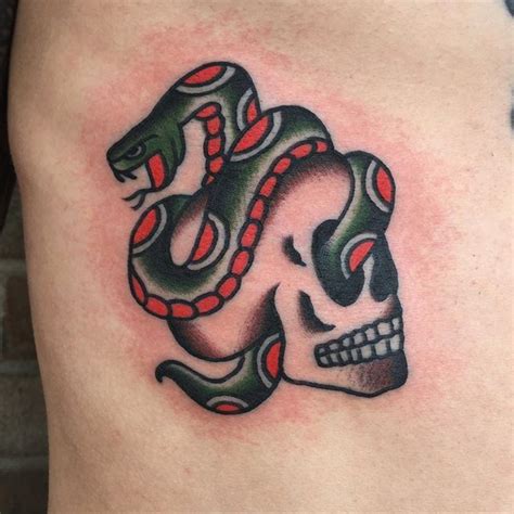 Snake tattoos can either fascinate or cause negative feelings. Pin on Traditional Tattoos