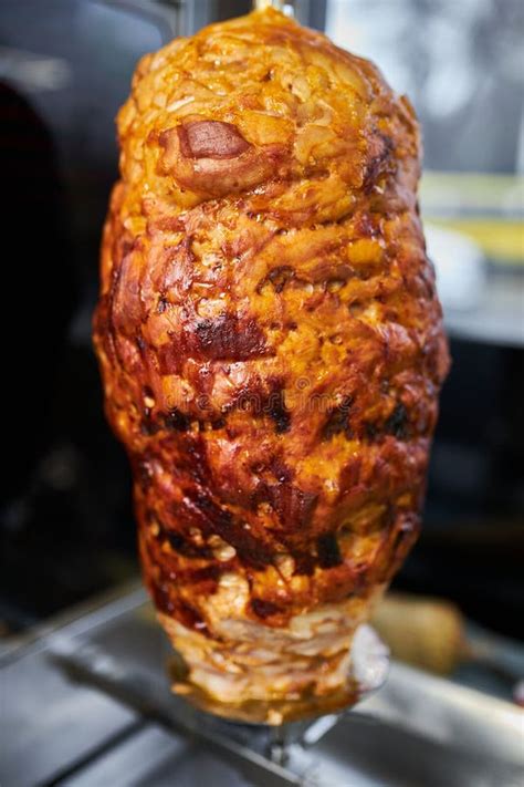 shawarma lamb on a spit street food doner kebab on a rotating spit a street food of turkey