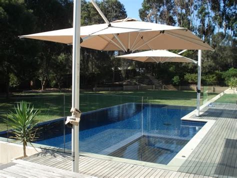 Two Square Cantilever Umbrellas For Pool Shade