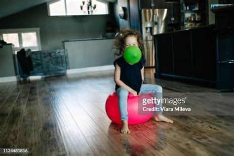 Girls Sitting On Balloons Bildbanksfoton Och Bilder Getty Images
