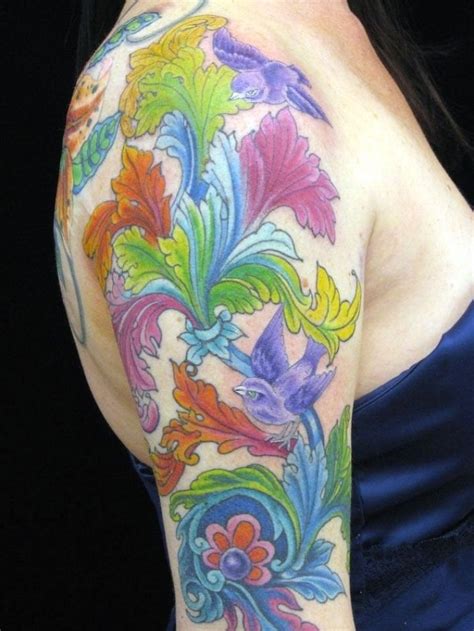 A Womans Arm With Colorful Flowers On It