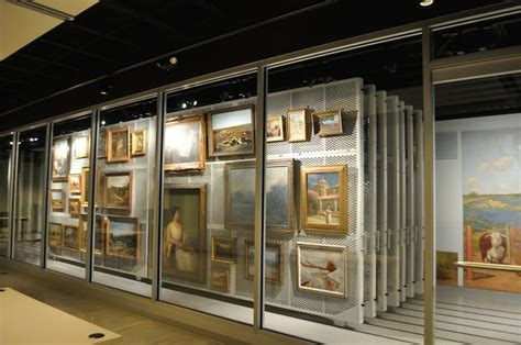 One way to introduce some visual interest is by hanging a textured piece of art. Art Storage: Mobile Art Rack System: Painting Storage | Patterson