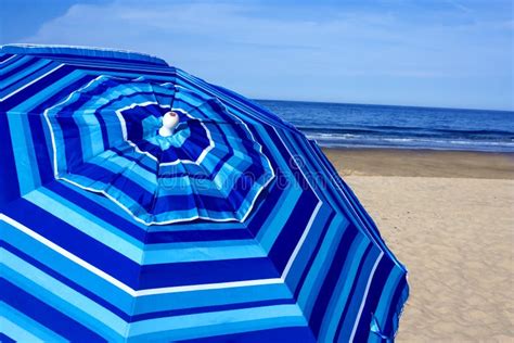 Blue Striped Beach Umbrella At Wellfleet Ma On Cape Cod Stock Image