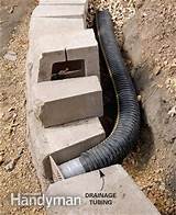 Pictures of How To Install Drain Pipe Behind Retaining Wall