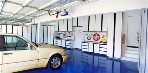 Custom Designed Garage White Cabinets With Blue Trim Tile Floor