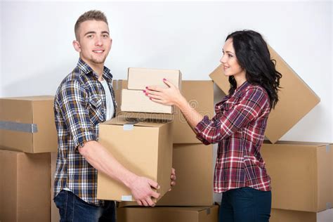 Couple Unpack Moving Boxes Stock Image Image Of Cheerful Male 34672167