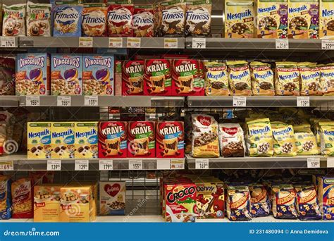 Breakfast Cereals Of Different Brands On The Shelves In The Store