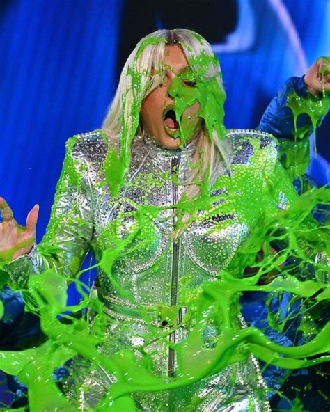 Bebe Rexhas Jumpsuit Shimmers As She Gets Covered In Green Slime Lens