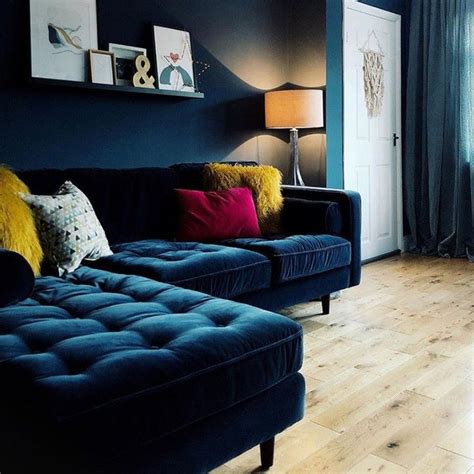 How To Decorate Around A Dark Blue Sofa Leadersrooms