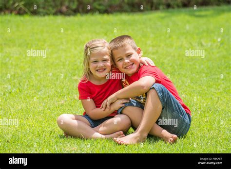 Two Brothers Hugging Other Fotos Und Bildmaterial In Hoher Auflösung