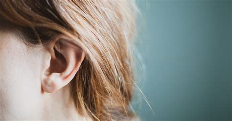 pimple in ear causes treatments prevention and more