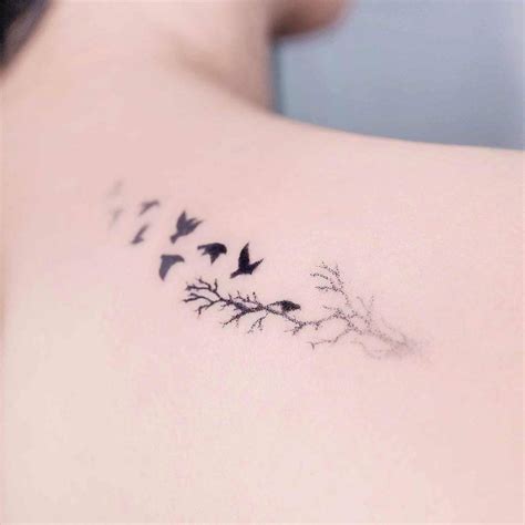 Dotwork Flying Birds And Branch Tattoo On The Shoulder