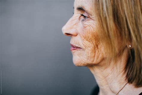 Profile Portrait Of A Wrinkled Senior Woman By Stocksy Contributor