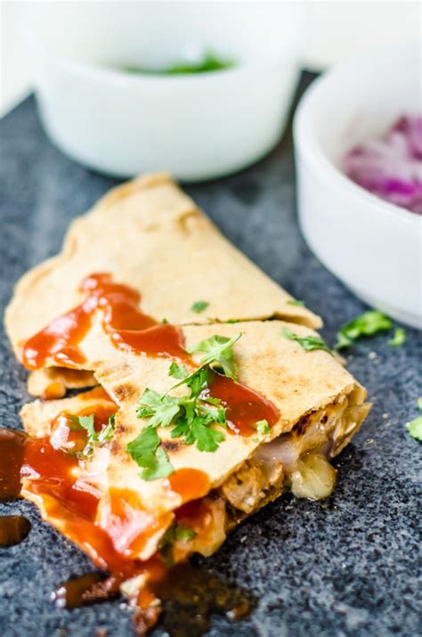 This crockpot chicken quesadilla recipe is so easy and packed with tons of flavor. BBQ Chicken Quesadilla Recipe - Saved by the Kale
