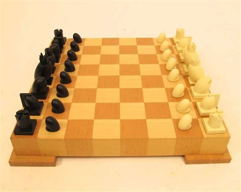 Thanks to its unusual design aesthetic, wobbly pieces, and ease of use, this elegant board is a great option to set up and leave on your coffee table for weeks on end. Modern Chess Set image 5