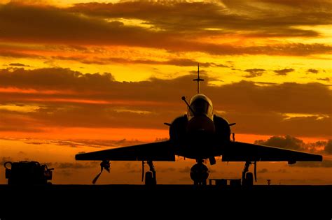 Download Orange Color Sky Silhouette Warplane Aircraft Jet Fighter