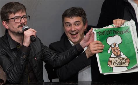 Photos Surviving Staff Of Charlie Hebdo Release New Issue Amidst Tears And A Few Laughs World
