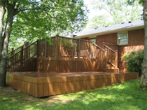 Traditional Deck Adjacent To Platform Deck By Stratton Exteriors In