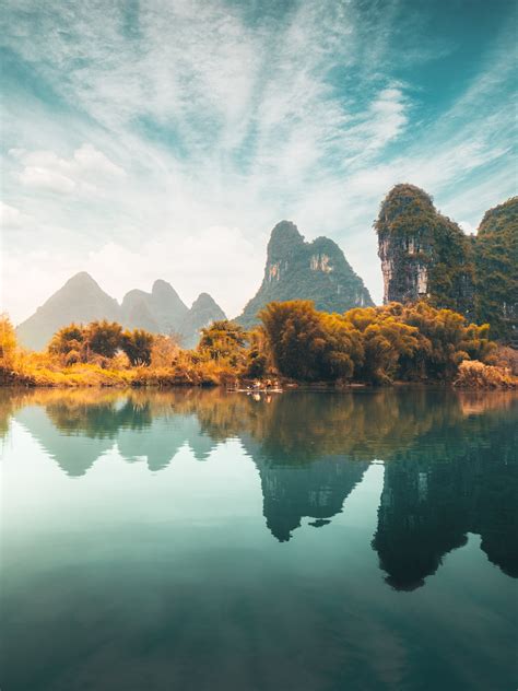 Learn The Story Behind This Photo Of A Cormorant Fisherman In China