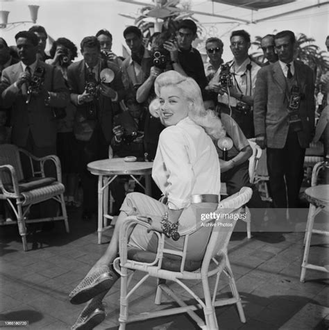 english actress diana dors poses for photographers at the 9th cannes news photo getty images
