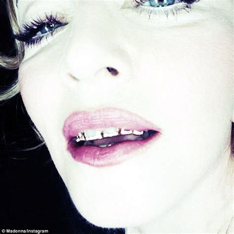 Madonna Continues Her Tough Girl Streak As She Shows Off Gold Teeth