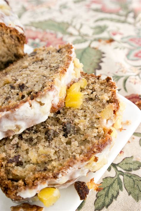 Hummingbird quick bread — the traditional hummingbird cake takes on a new form in this moist, delicious sweet bread loaded with coconut, pineapple and bananas. Humming Bird Bread with Pineapple Glaze