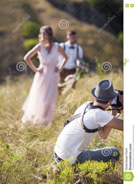 Photographer In Action Stock Image Image Of Background 77346613