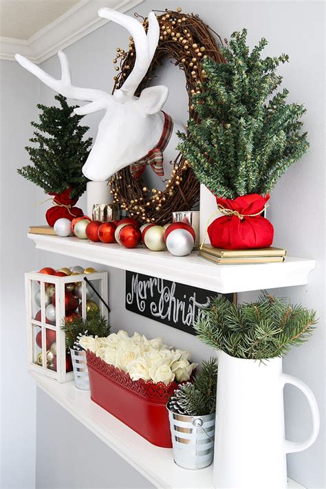 .the christmas decorations are put up, christmas shopping for the best buys of the year begins and the homemade christmas wreath is hung on the door so it's easy to forget about elf on the shelf by the time christmas day rolls around. How to Style Floating Shelves for the Holidays | Abby Lawson