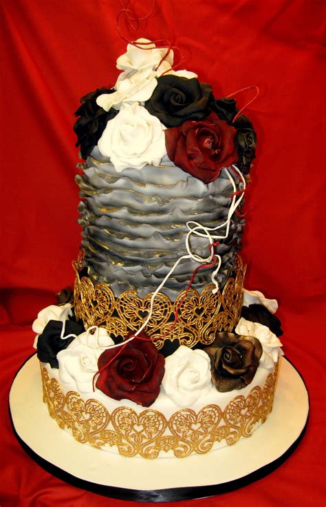 Goth Style Wedding Cake With Gold Lace Hearts Made From Cake Lace