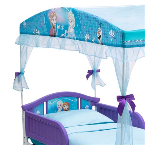 The whole stands flat on a floor. Frozen Toddler Canopy Bed - Delta Children