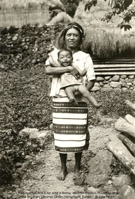 Woman With A Happy Child In Her Arms In Bontoc Northern L Flickr