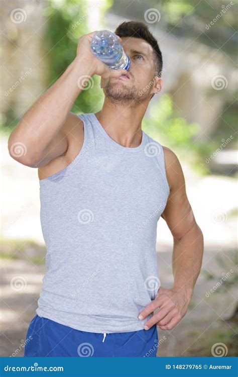 Young Sportsman Drinking Water In Park Stock Image Image Of Shirt